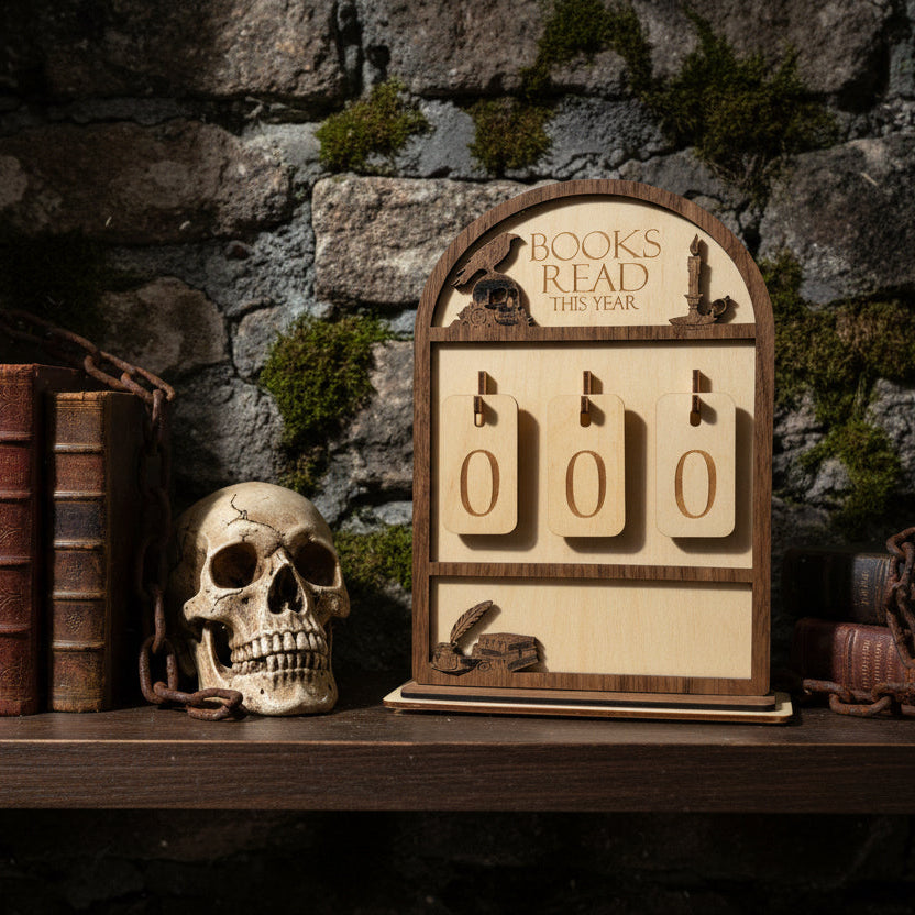 Decorative shelf with books, skull, and wooden sign against a stone wall.